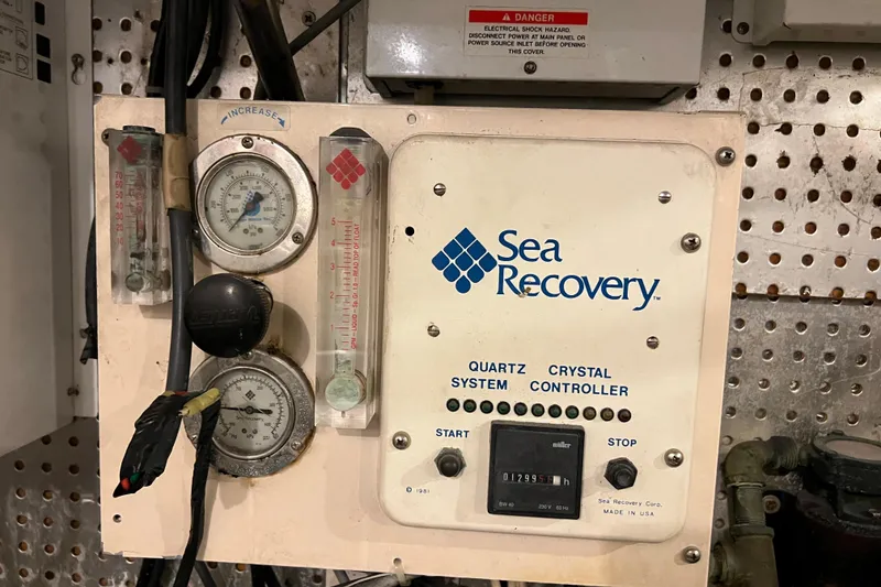 Slide: The Image of Sea Recovery system controller on 1996 Monte Fino 92 yacht, featuring gauges and controls. - 45