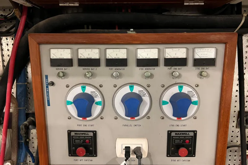 Slide: The Image of Control panel of a 1996 Monte Fino 92 yacht with gauges and switches. - 46