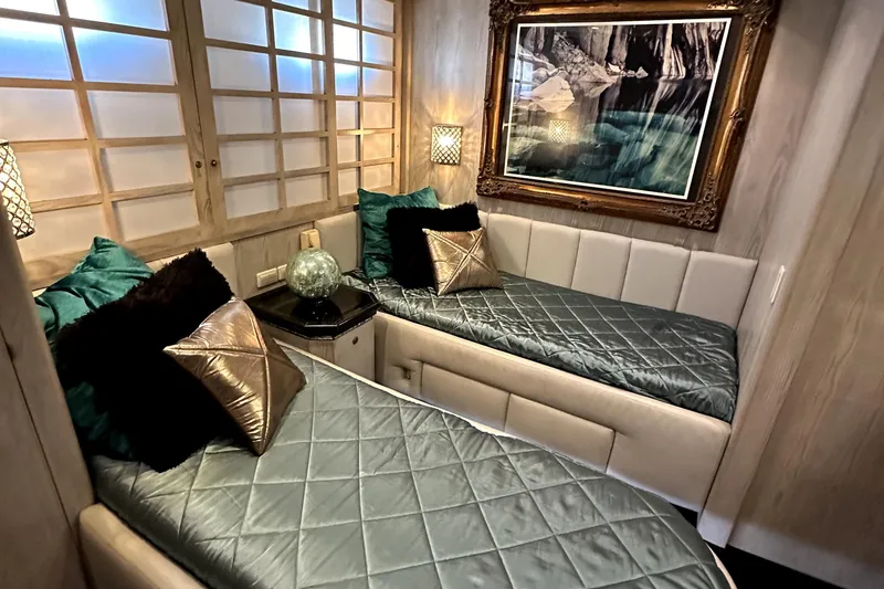 Slide: The Image of Luxurious twin cabin interior on 1996 Monte Fino 92 yacht with elegant decor. - 69