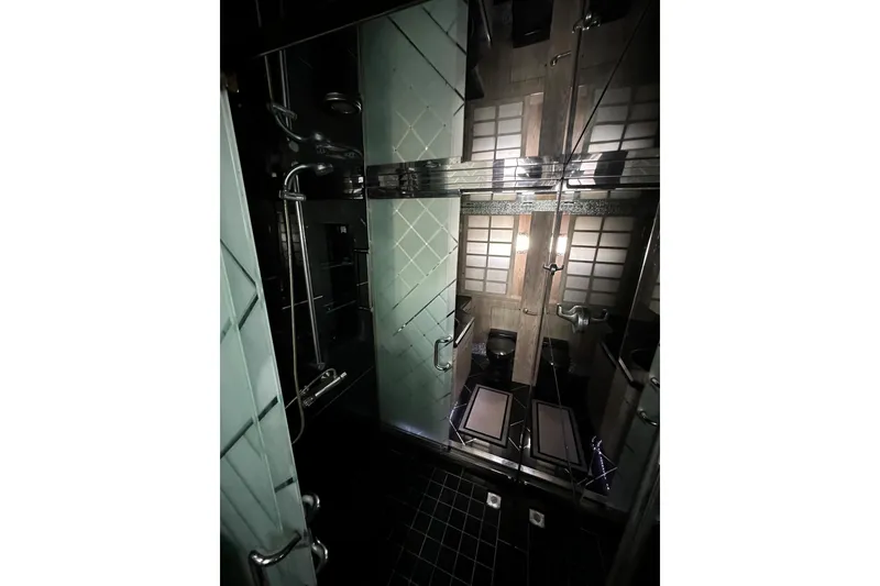 Slide: The Image of Luxurious bathroom interior on a 1996 Monte Fino 92 yacht, featuring modern fixtures and elegant design. - 74