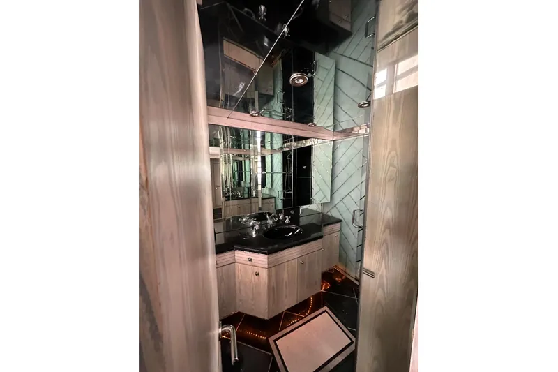 Slide: The Image of Luxurious bathroom interior on 1996 Monte Fino 92 yacht, featuring sleek design and modern fixtures. - 75