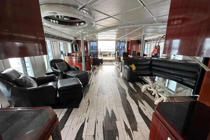Slide: The Image of Luxurious interior of a 1996 Monte Fino 92 yacht with elegant seating and modern design. - 90