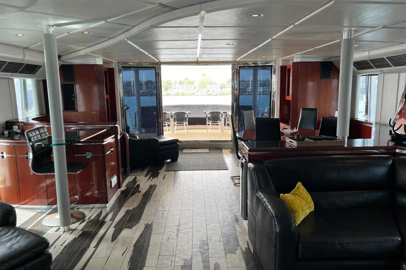 Slide: The Image of Luxurious interior of a 1996 Monte Fino 92 yacht with elegant wood finishes. - 96