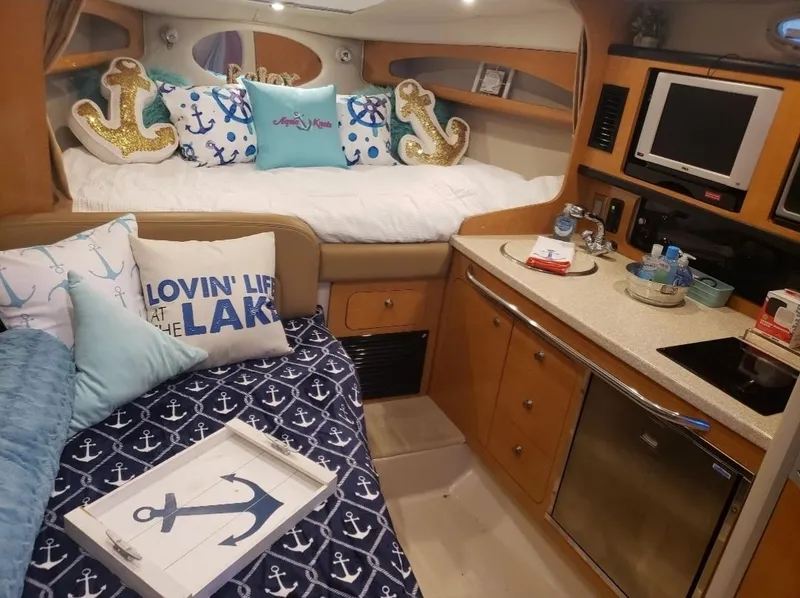 Slide: The Image of Interior of 2006 Chaparral Signature 280 yacht with nautical decor. - 6