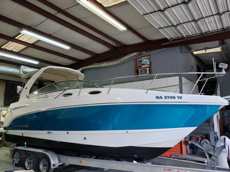 Slide: The Image of 2006 Chaparral Signature 280 boat in a workshop. - 9