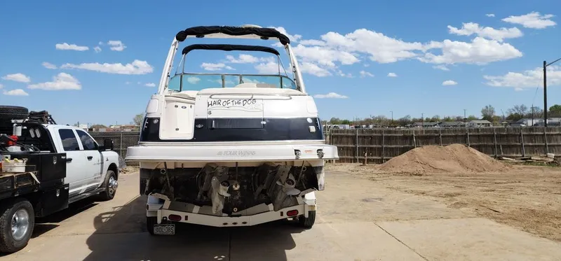 Slide: The Image of Rear view of a 2005 Four Winns 288 Vista boat on a trailer. - 10