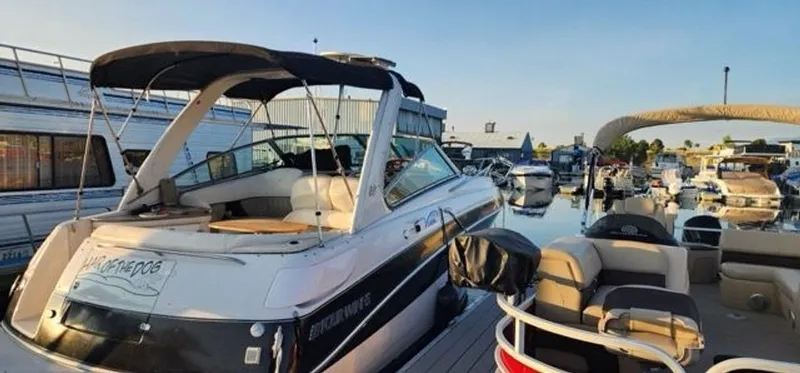 Slide: The Image of 2005 Four Winns 288 Vista boat docked at marina during sunset. - 3