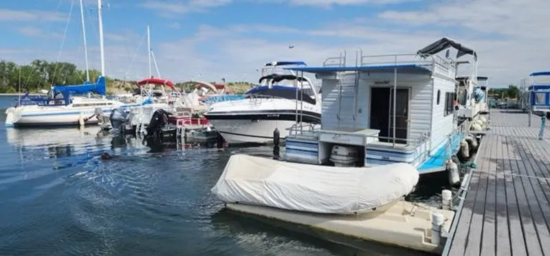 Slide: The Image of Boats docked at marina, including a 2005 Four Winns 288 Vista. - 7