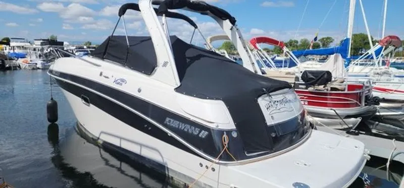Slide: The Image of 2005 Four Winns 288 Vista boat docked at marina. - 9