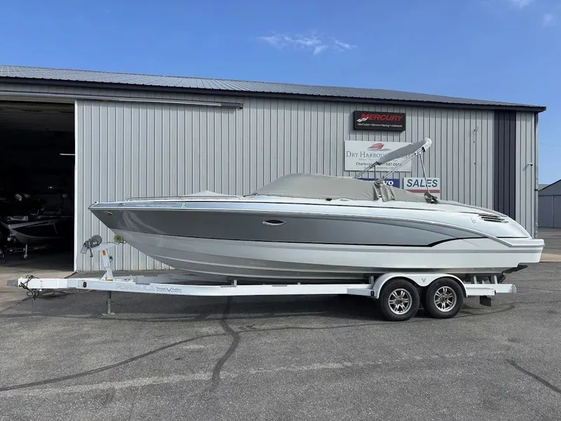 The Image of 2010 Formula 270 Bowrider on trailer outside warehouse. - 1