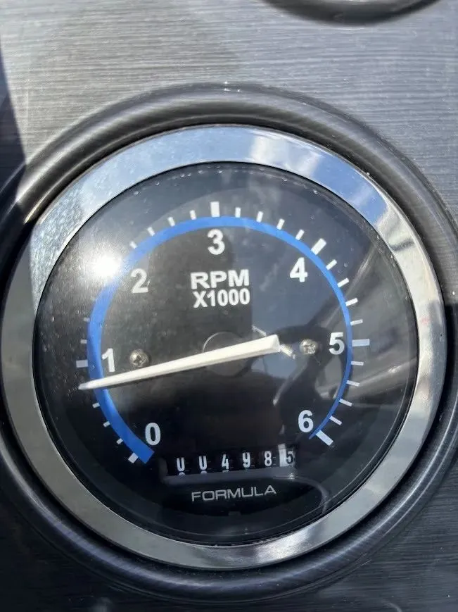 Slide: The Image of Tachometer of a 2010 Formula 270 Bowrider boat, displaying 4900 RPM. - 12