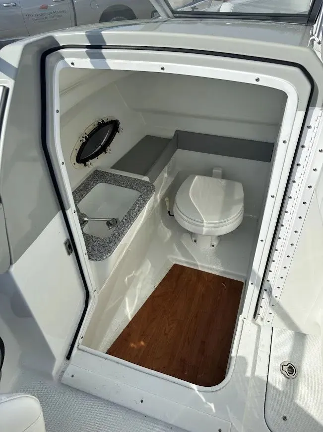 Slide: The Image of Interior of a 2010 Formula 270 Bowrider with toilet and sink. - 13