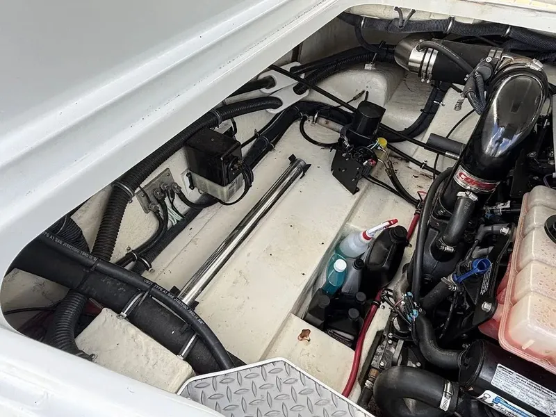 Slide: The Image of Engine compartment of 2010 Formula 270 Bowrider boat, showing engine and wiring. - 15