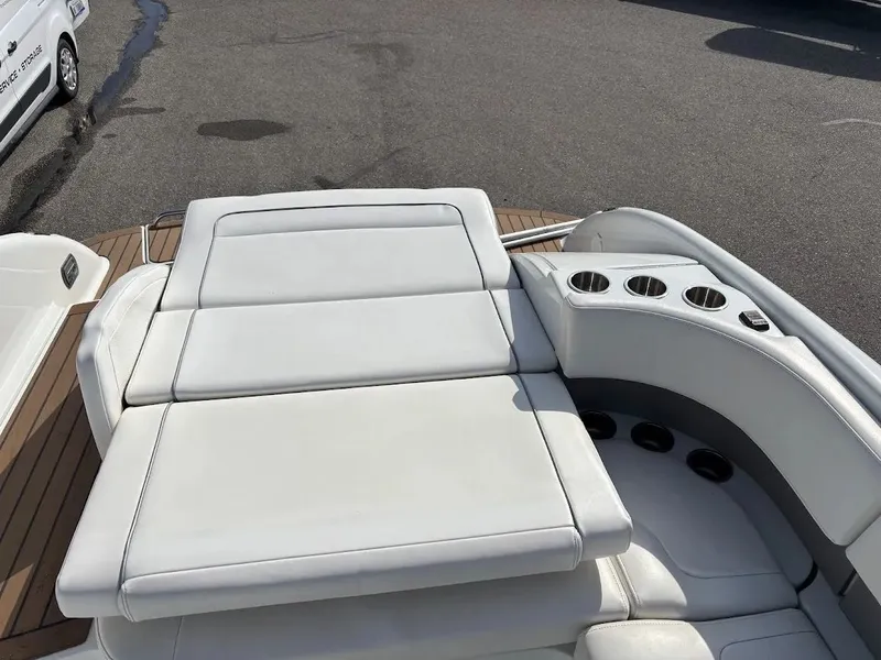 Slide: The Image of 2010 Formula 270 Bowrider with white upholstery and cup holders. - 23