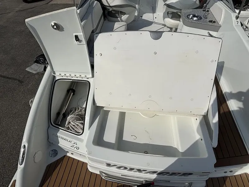 Slide: The Image of 2010 Formula 270 Bowrider with open storage compartment and rope. - 24
