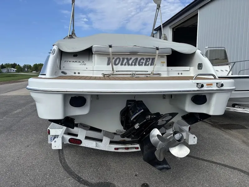 Slide: The Image of Rear view of a 2010 Formula 270 Bowrider boat on a trailer. - 3