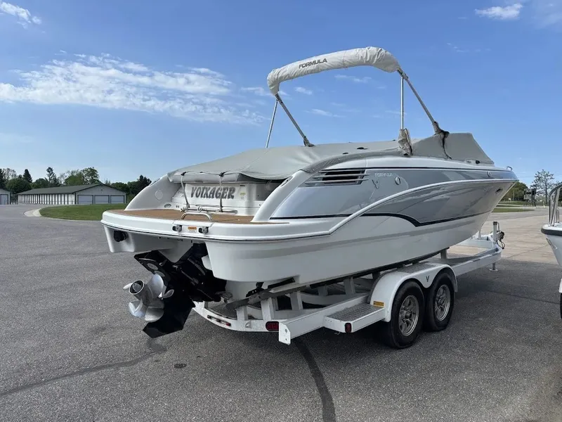 Slide: The Image of 2010 Formula 270 Bowrider boat on trailer, side view. - 4