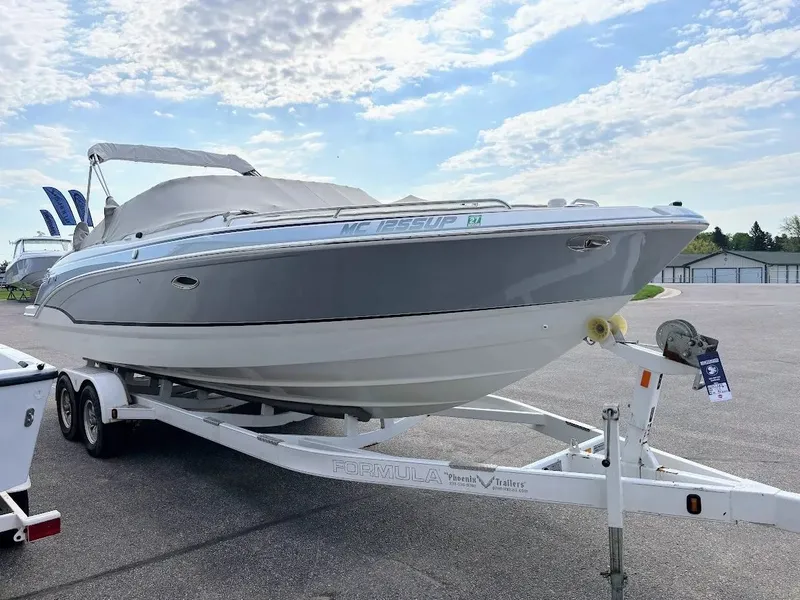 Slide: The Image of 2010 Formula 270 Bowrider on trailer under blue sky. - 5