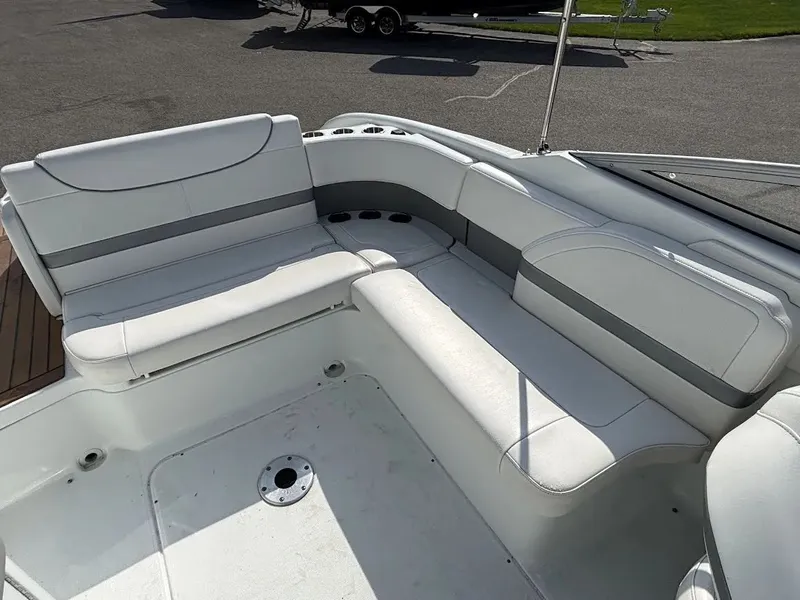 Slide: The Image of Interior of a 2010 Formula 270 Bowrider with white seating. - 8