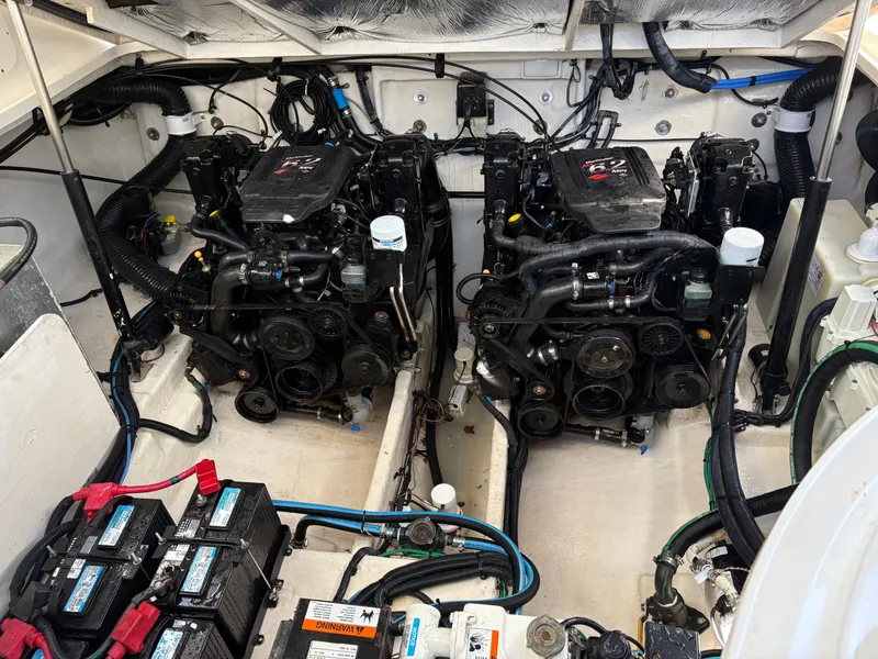 Slide: The Image of Engine room of 2006 Sea Ray Sundancer 320 with dual engines. - 19