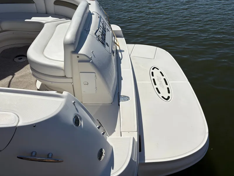 Slide: The Image of Rear view of a 2006 Sea Ray Sundancer 320 on the water. - 4