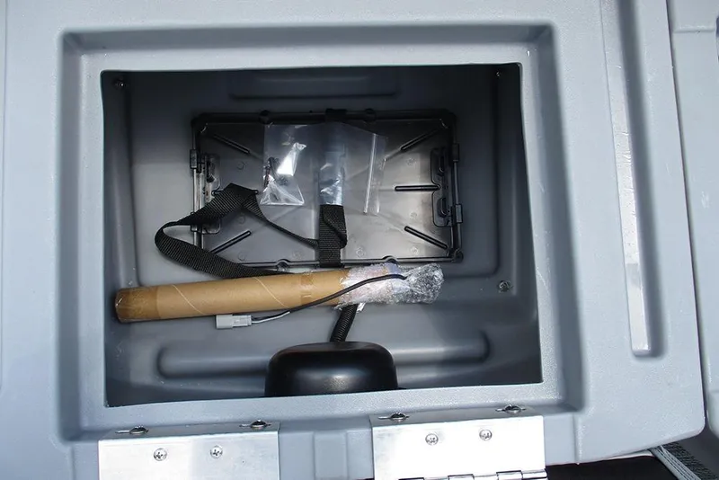 Slide: The Image of Storage compartment of 2026 Bentley Pontoons Bolt 203 with accessories inside. - 11