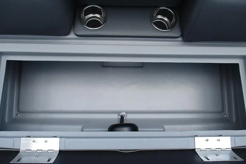 Slide: The Image of Interior storage compartment of 2026 Bentley Pontoons Bolt 203 with cup holders. - 20