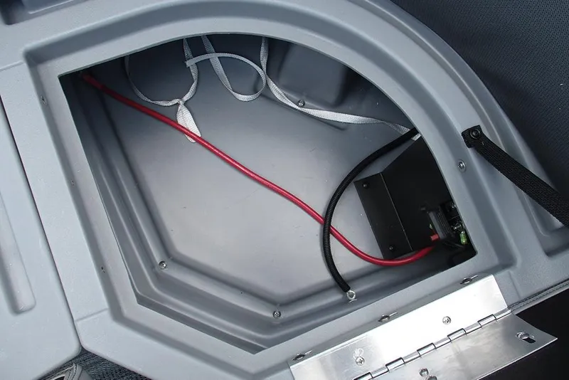 Slide: The Image of Storage compartment of 2026 Bentley Pontoons Bolt 203 with visible wiring. - 25