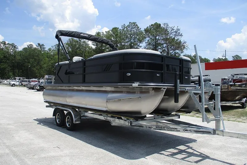 Slide: The Image of 2026 Bentley Pontoons Bolt 203 on trailer, parked outdoors under a clear sky. - 5