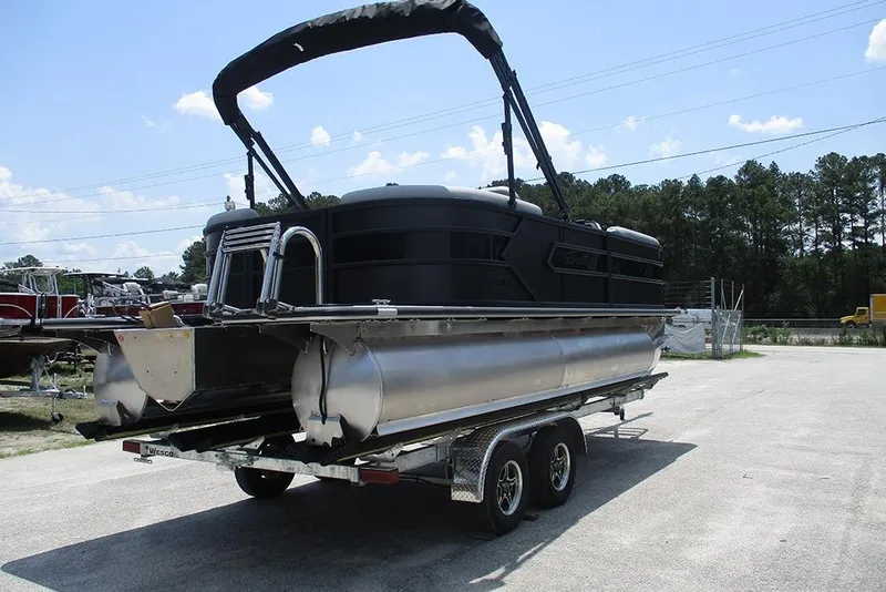 Slide: The Image of 2026 Bentley Pontoons Bolt 203 on trailer, parked outdoors under clear sky. - 7