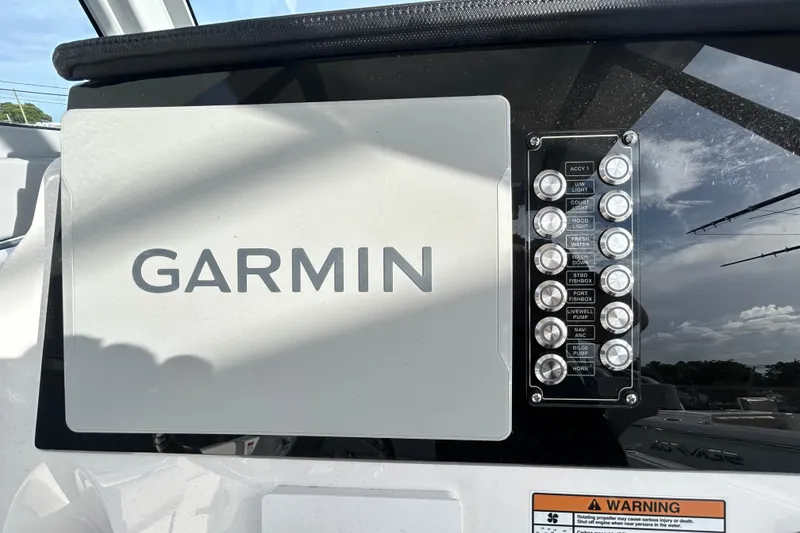 Slide: The Image of Garmin display and control panel on 2026 Sea Fox 268 Commander boat. - 9