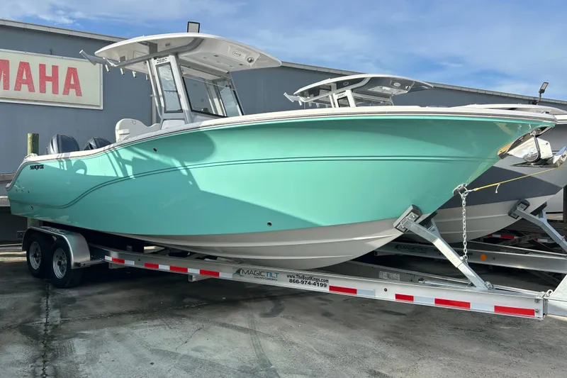 The Image of 2026 Sea Fox 268 Commander boat on trailer, displayed outdoors. - 0