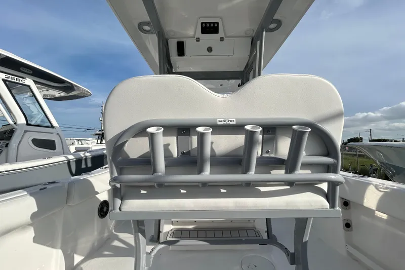 Slide: The Image of 2026 Sea Fox 268 Commander boat interior with rod holders and seating. - 5
