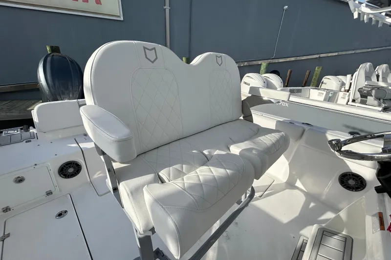 Slide: The Image of Luxury seating on 2026 Sea Fox 268 Commander boat, featuring diamond-stitched upholstery. - 10