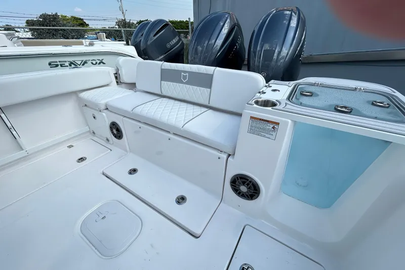 Slide: The Image of 2026 Sea Fox 268 Commander boat interior with seating and Yamaha engines. - 20