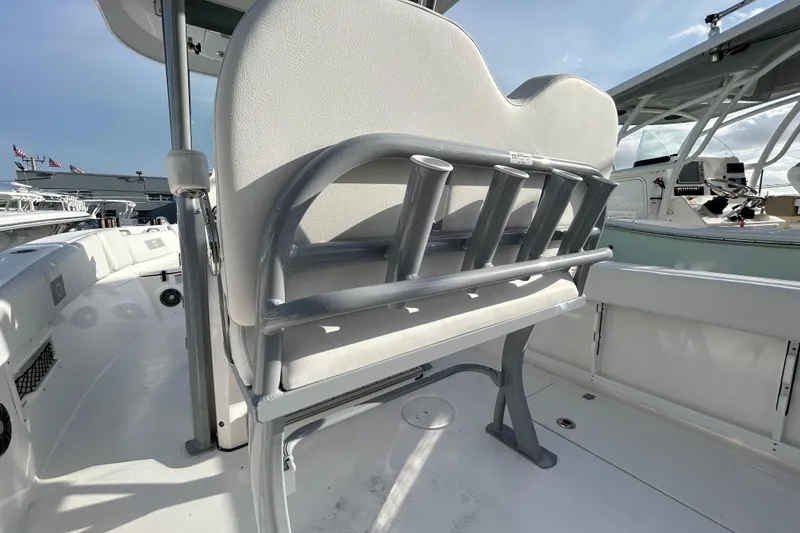Slide: The Image of 2026 Sea Fox 268 Commander boat interior with rod holders and seating. - 4