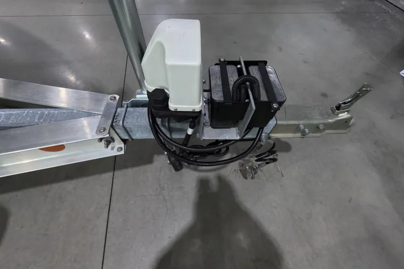 Slide: The Image of Trailer hitch assembly for 2024 Skeeter SX2550 Family boat on concrete floor. - 22