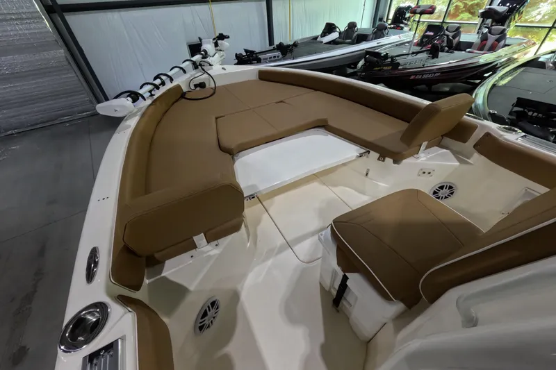 Slide: The Image of 2024 Skeeter SX2550 Family boat interior with tan seating and modern design. - 6
