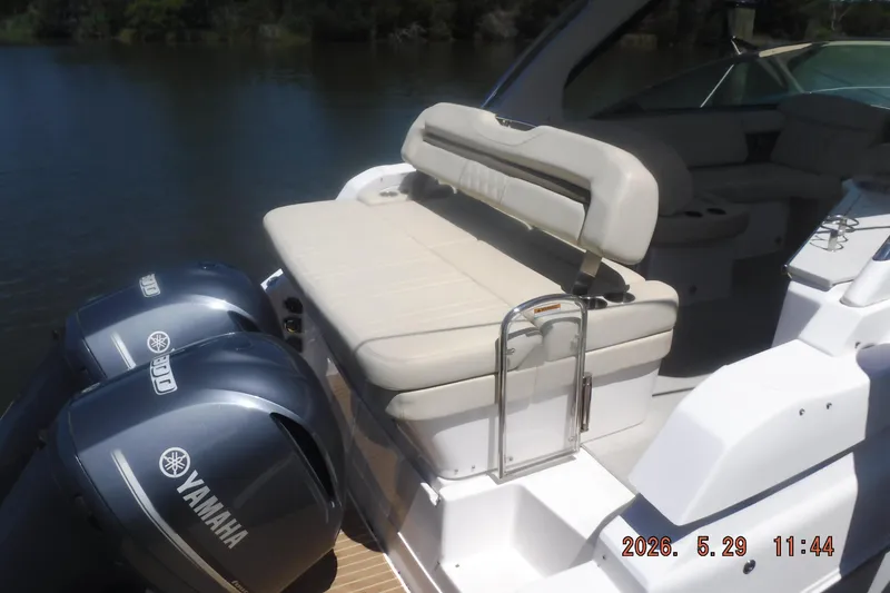 Slide: The Image of 2020 Regal 33 XO boat with Yamaha engines and comfortable seating. - 22