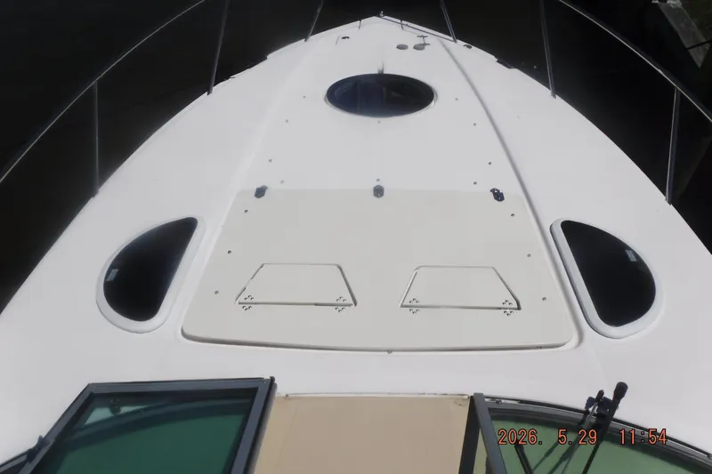 Slide: The Image of 2020 Regal 33 XO boat deck with hatches and railing. - 35