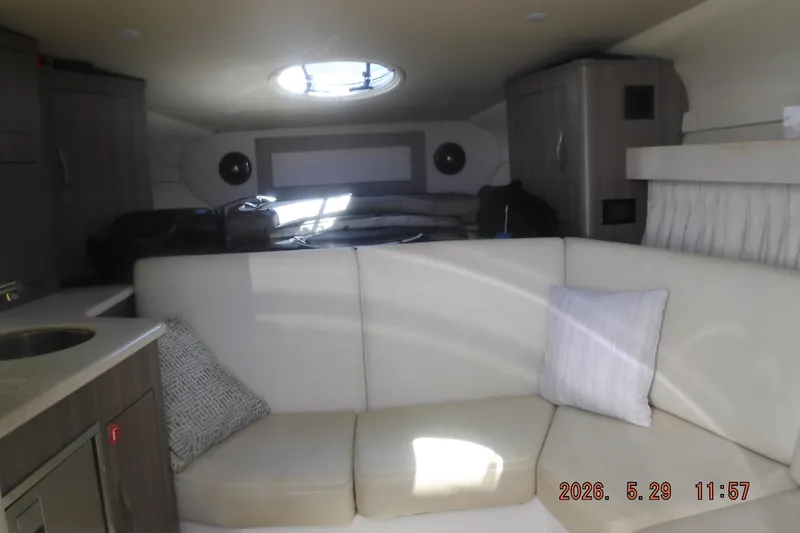 Slide: The Image of Interior of a 2020 Regal 33 XO yacht with white seating and modern design. - 38