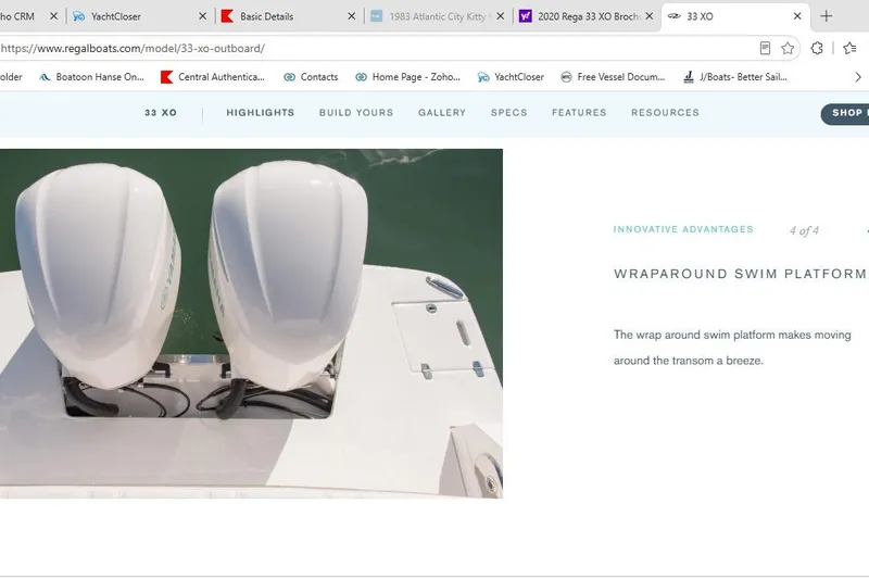 Slide: The Image of 2020 Regal 33 XO boat with dual outboard engines and wraparound swim platform. - 4