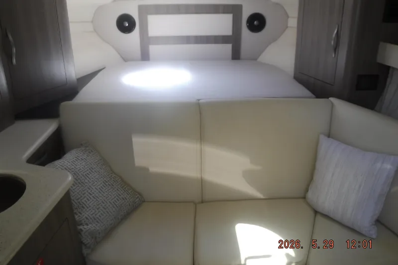 Slide: The Image of Interior of 2020 Regal 33 XO boat with cozy seating and modern design. - 44