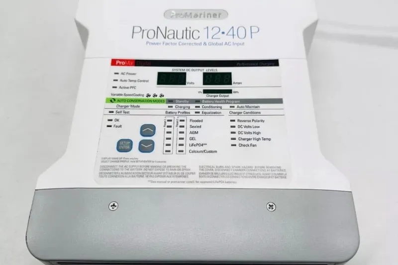 Slide: The Image of ProMariner ProNautic 12-40P marine battery charger on a 2020 Regal 33 XO boat. - 55