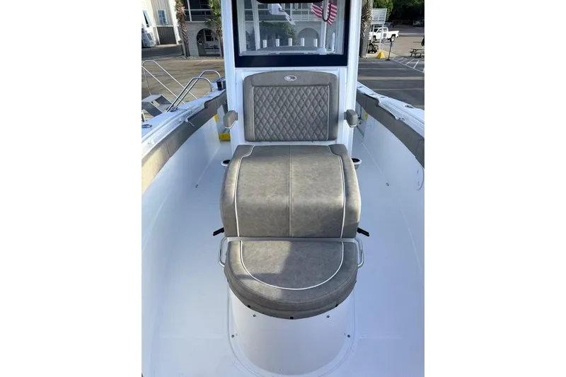 Slide: The Image of 2026 Sea Hunt Gamefish 30 Coffin Box boat interior with cushioned seating. - 13
