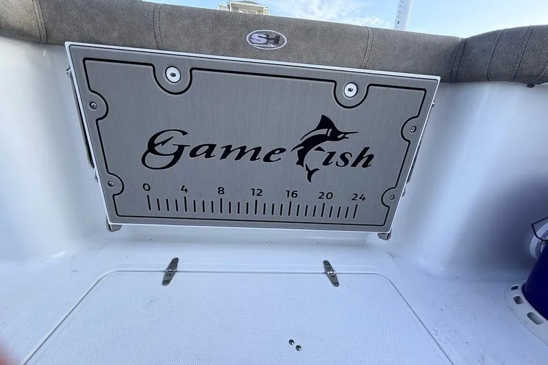 Slide: The Image of 2026 Sea Hunt Gamefish 30 Coffin Box with measuring scale and logo. - 22