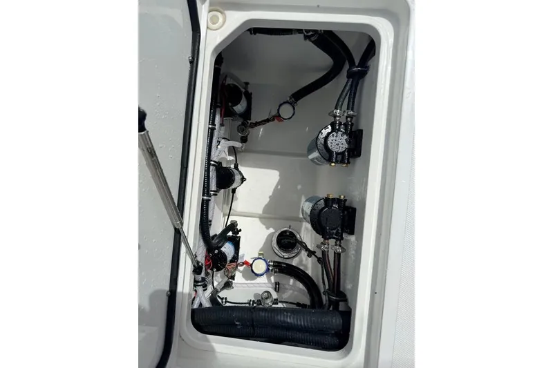 Slide: The Image of 2026 Sea Hunt Gamefish 30 Coffin Box interior with visible mechanical components. - 35