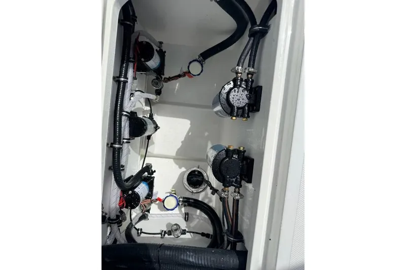Slide: The Image of 2026 Sea Hunt Gamefish 30 Coffin Box interior wiring and plumbing components. - 36