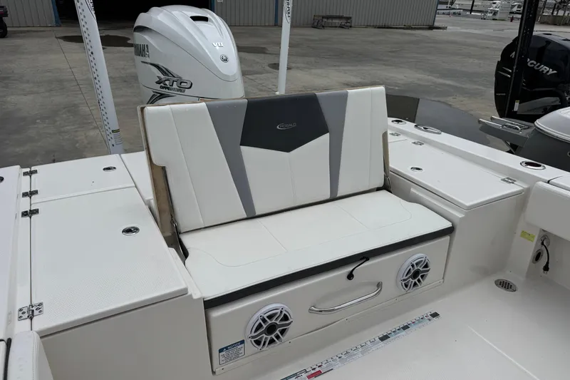 Slide: The Image of 2023 Robalo 266 Cayman boat interior with Yamaha XTO engine and seating area. - 14