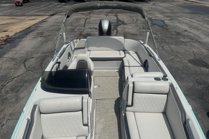 Slide: The Image of 2022 Crownline Eclipse E205 XS Fish boat with spacious seating and sleek design. - 5